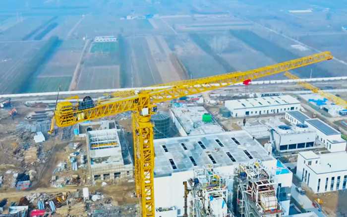 又一超大吨位！ 皇冠welcome官网塔机助力城市绿色升级